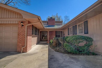 Property entrance featuring a garage