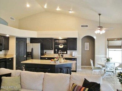 FAMILY ROOM LOOKING INTO THE KITCHEN