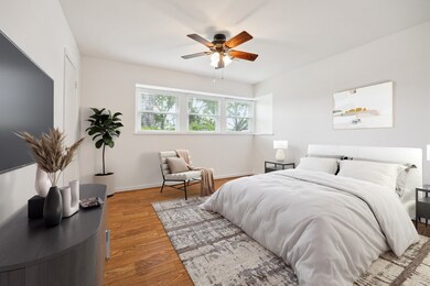 Second Bedroom downstairs, virtually staged.