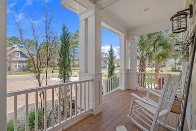 Wooden terrace with a residential view and a porch