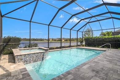 View of pool featuring a water view, an in ground