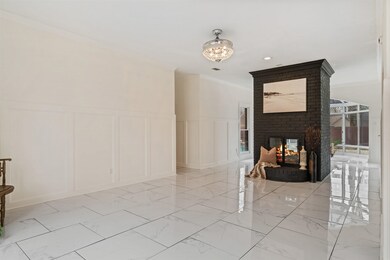 Interior space with double sided fireplace