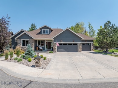 Oversized 3 Car Garage with large parking pad and