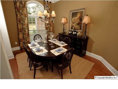 Beautiful Dining Room with tall ceilings and columns! Pictures of a Tucker Model Home