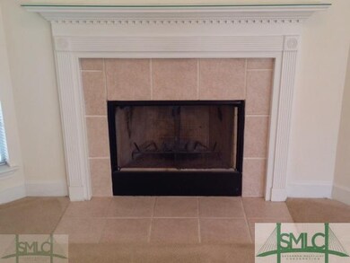 Den/Family/Great Room. Wood burning fireplace in f