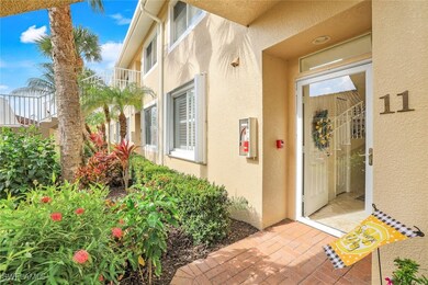 Doorway to property with stucco siding