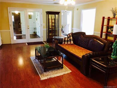 Family room.  Notice adjoining 4 season room with 
