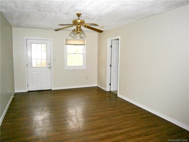 Living Room & Entry To Master Suite