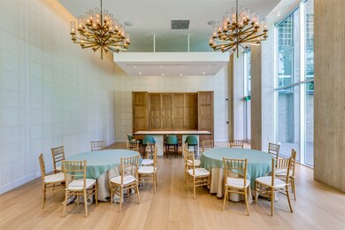 Dining space featuring a notable chandelier and wood finished floors