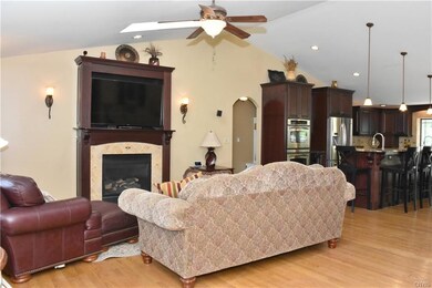Cherry gas fireplace warms the room in the cooler 