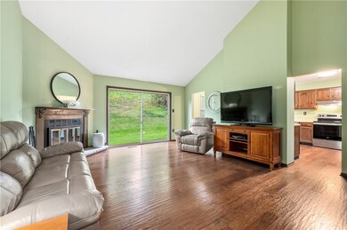 A large sliding glass door provides plenty of natu