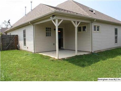 Relax on the Covered Patio with the Fenced Back ya