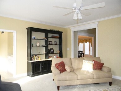 Nice crown molding and built-in bookshelf in famil