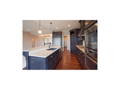 Pre-finished Hand-scrapped hardwood floors in entr
