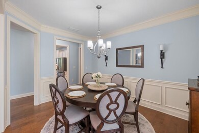 Elegant Dining Room with Timeless Appeal Perfectly Sized for Intimate Dinners or Holiday Gatherings, Just Steps from the Heart of the Home.