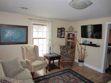 The Living Room has new wood laminate floors and e
