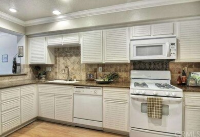 New stove and above microwave along with ceramic b