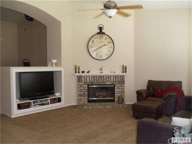 Family Room with Cozy Fireplace and Media Niche