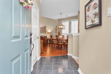 Front door opens into tiled entry hall
