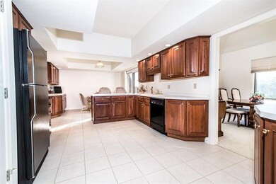 This spacious kitchen has an abundance of cabinets