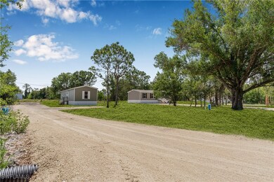Manufactured / mobile home with driveway and a fro