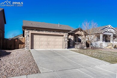 Ranch-style home with a garage