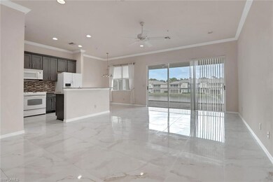 Unfurnished living room with crown molding, light marble finish flooring, recessed lighting, and ceiling fan