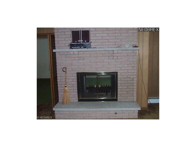 Family room side of fireplace.