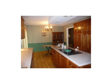 Kitchen looking at eating area, hardwood floors, c