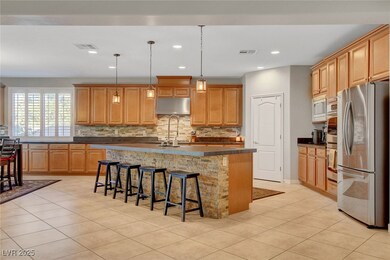 This grand Kitchen features an abundance of cabine