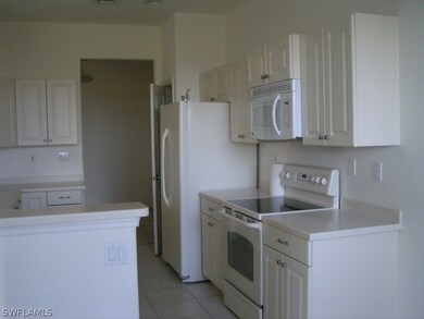 12858 Carrington Cir unit 103, Naples, FL 34105 - photo 6