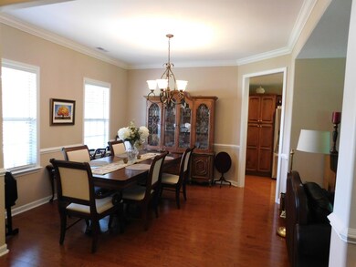 DINING ROOM WITH HARDWOOD FLOORS