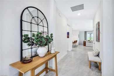 Entry foyer, glass door lets in the Florida sunshi