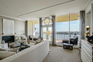 Wall of windows w/ French doors leading to private