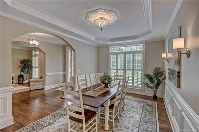 This spacious dining room will hold a large dining