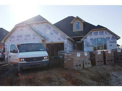 Exterior Front. Current stage of construction. Pho