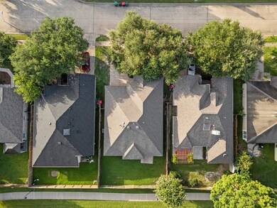 AERIAL SHOT SHOWING THE NEW ROOF. HOUSE IS THE MID