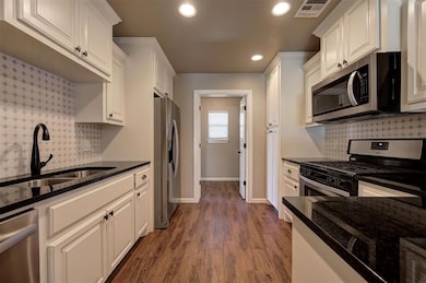 Kitchen - Custom backsplash,Canned lighting, Stain