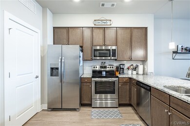 Kitchen featuring ceiling fan, french doors, stain