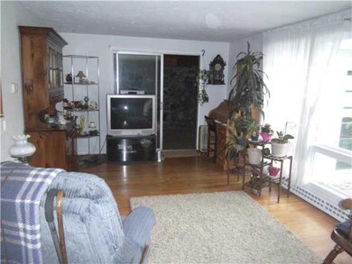 Living Room The Living room offers hardwood floors