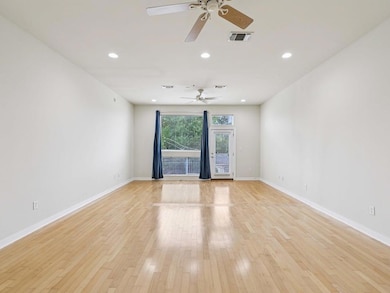 Spare room with a ceiling fan, baseboards, light 