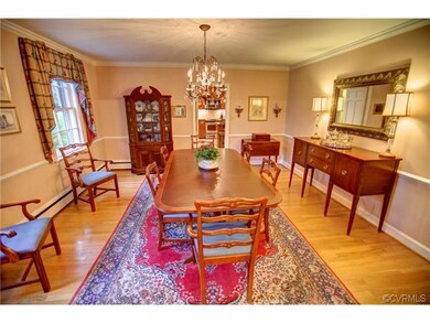 Formal Dining Room with 2 bright windows and chair