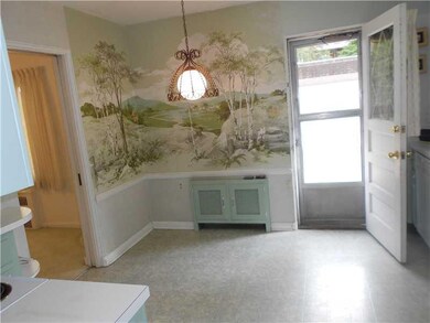 Kitchen. EATING AREA IN KITCHEN - DOOR LEADS TO YA