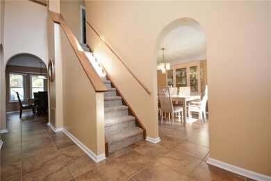Inviting 2 story entry with tons of natural light!