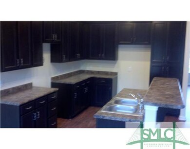 Kitchen. Galley Kitchen with Island Bar.