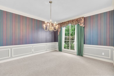 Dining room sits off the entry.