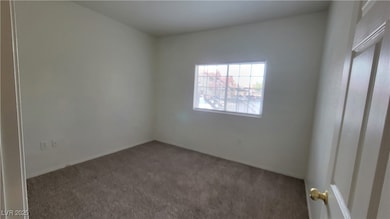 Spare room featuring carpet floors