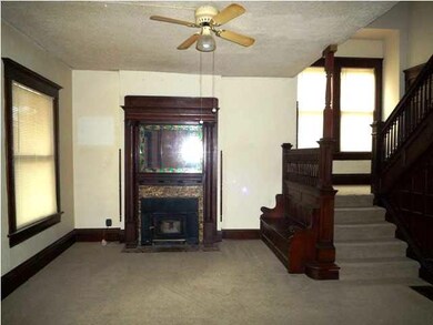 wood burning fireplace in the HUGE living room
