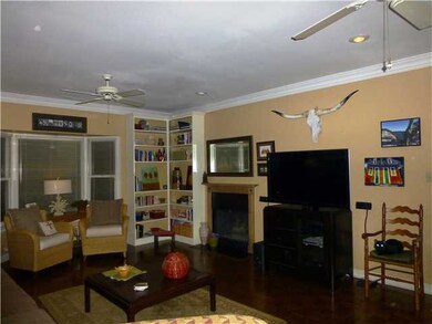 The living room is right off the entry and kitchen