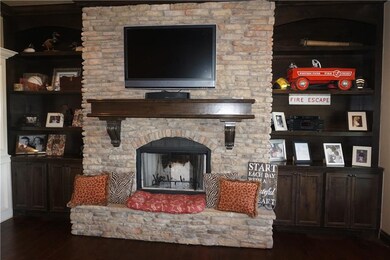 Another view of wood burning fireplace